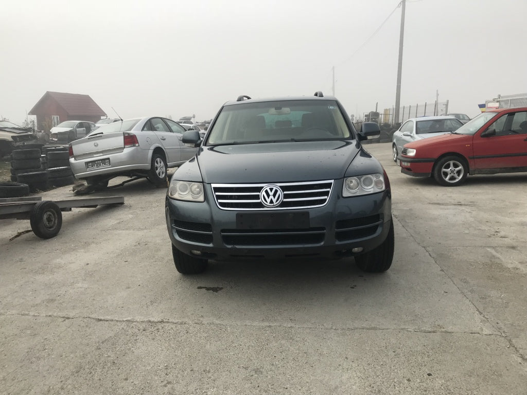 Dezmembram vw touareg 2,5 tdi anul 2006 tip motor bpe 174 cp