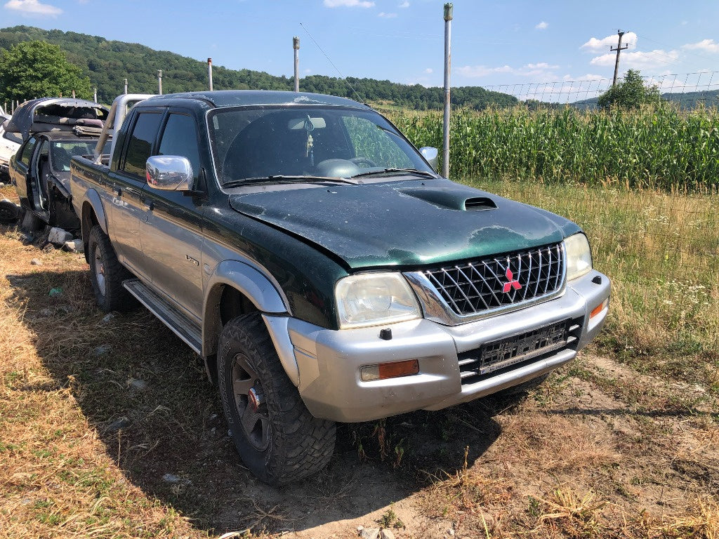 Dezmembrari dezmembrari piese dez mitsubishi l200 2003 2,5 diesel 4x4 volan stanga