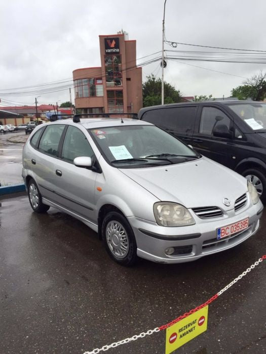Dezmembrez nissan almera tino 2,2 dci fab 2004.