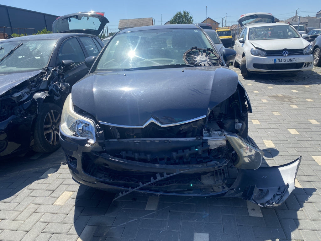 Dezmembrez piese caroserie, motor, cutie viteze, suspensie Citroen C4 (I) 1.4 16v benz 2007, KFU