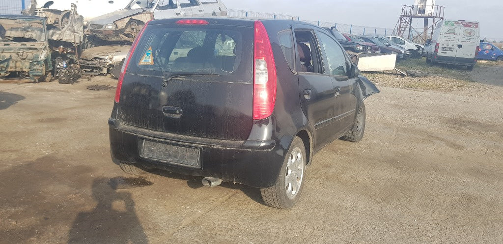 Mitsubishi Colt VI,din 2005, motor 1.5 benzina, tip 135.950 (4A91)